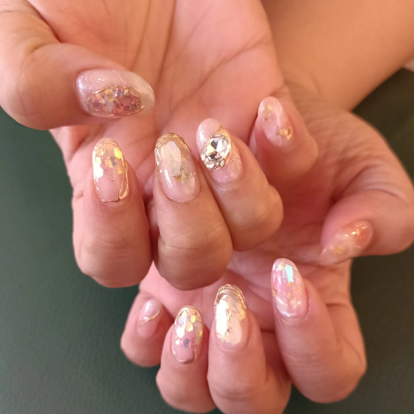 Nail art with foil and marble detailing